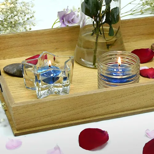 Vista 4 de Zest Candle Velas flotantes de 12 piezas, 1.75 pulgadas, gel azul transparente
