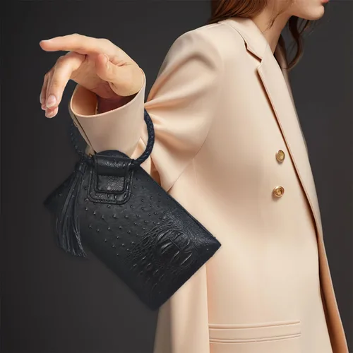 Vista 2 de NGIL Mini bolso de pulsera de piel sintética para mujer con borla de flecos, cartera de pulsera para mujer