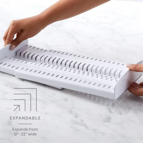 Vista 2 de YouCopia StoreMore - Estante expandible para sartenes y tapas, organizador de sartenes ajustable de 12.5 a 22 pulgadas de ancho para almacenamiento