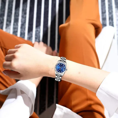Vista 4 de Reloj clásico de acero inoxidable plateado impermeable de cuarzo analógico de moda para mujer