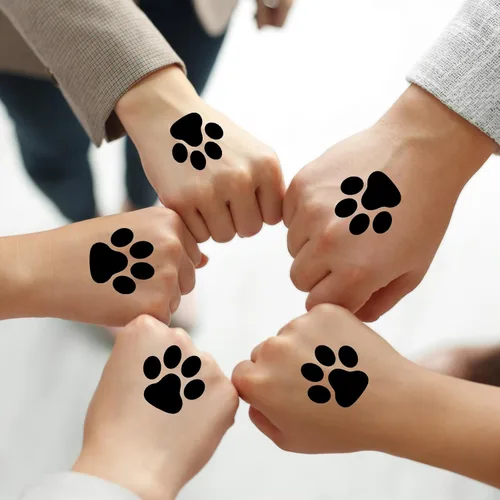 Vista 6 de Harloon 20 hojas de 300 tatuajes temporales de huellas de patas, tatuajes faciales para perros, calcomanías extraíbles para Cheer Patrol para Negro