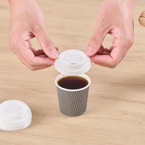 Vista 6 de Solo tapas: tapas de taza de café compostables Basic Nature, 500 tapas desechables para tazas de bebidas calientes. Las tazas se venden por