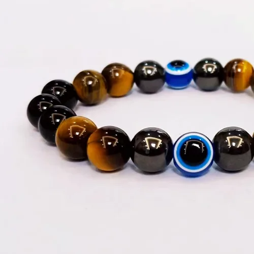 Vista 3 de Pulseras de triple protección con piedra de ojo de tigre de obsidiana negra con hematita para hombres y mujeres, pulsera de piedra curativa