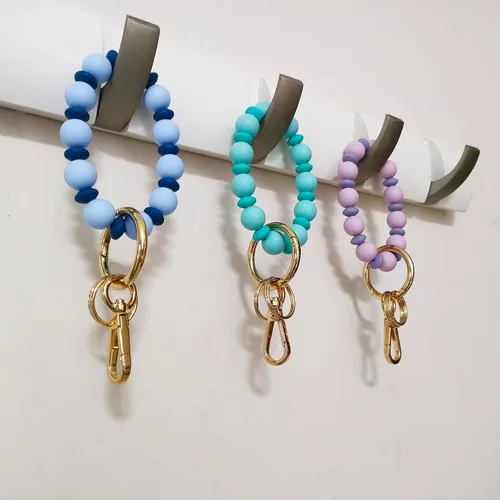 Vista 5 de Junyuerly Llavero de silicona con cuentas para mujer, pulsera elástica para llavero