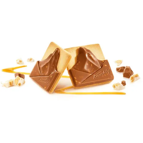 Vista 2 de Kambly Galletas Mont Choco, 3.5 oz Galletas de mantequilla con una tableta de chocolate con leche con trozos de turrón Producto de Suiza