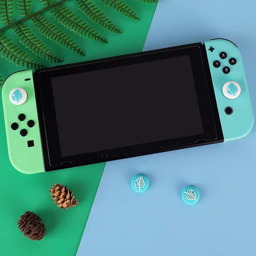 Vista 2 de Tscope Lindas tapas de agarre para el pulgar para Nintendo SwitchLiteOLED para Animal Crossing Kawaii Leaf Joystick Analog Soft Silicone Button