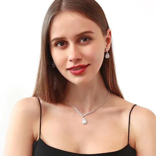 Vista 2 de Paxuan Juego de aretes de pulsera de cristal de diamantes de imitación plateados y dorados para mujeres, novias, damas de honor, juego de aretes