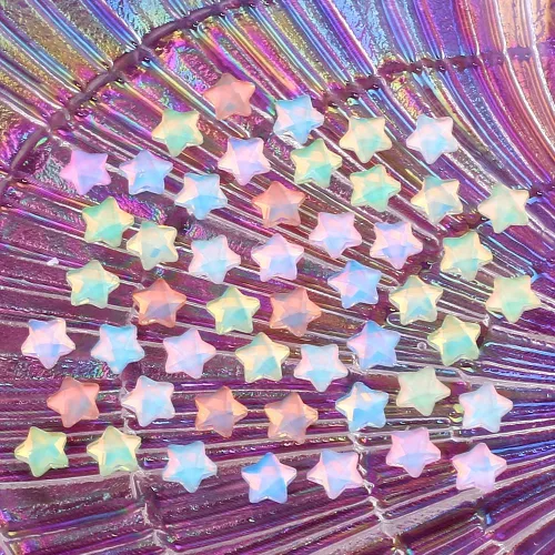 Vista 2 de 50 dijes de uñas Kawaii de estrella moca de 0.236 pulgadas para uñas, mini estrellas 3D, diamantes de imitación de uñas con parte trasera plana