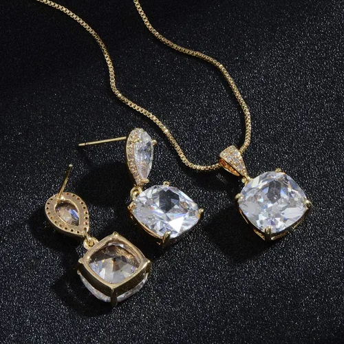 Vista 4 de Conjunto de joyería para boda, aretes de lagrima y collar con dije de circonio cúbico