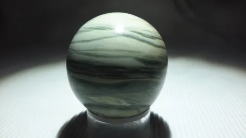 Vista 18 de Auténtica colección de esferas pulidas de piedra semipreciosa (jaspe brezado)