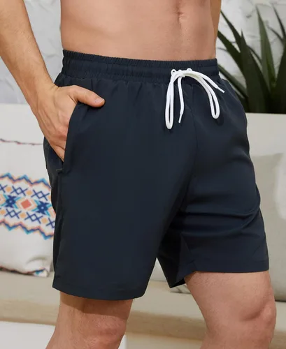 Vista 2 de Traje de baño para hombre con forro de compresión de 7 pulgadas, de secado rápido, con bolsillos con cremallera