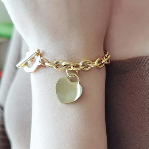 Vista 4 de WangGao Elegent Love - Pulsera de eslabones de acero inoxidable con dije de corazón en blanco para mujer