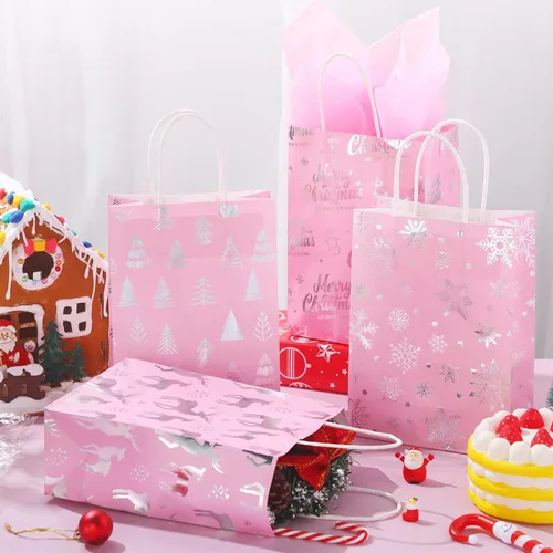 Vista 3 de Pasimy 24 bolsas de regalo de Navidad rosadas con papel de seda, bolsa de papel de dulces de Navidad rosa con lámina metálica plateada de copo