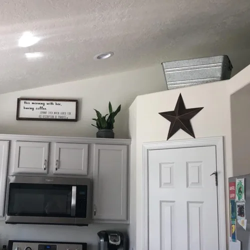 Vista 5 de EBEI Decoración de pared para el hogar de 12 pulgadas con diseño rústico de granero, estrella de metal