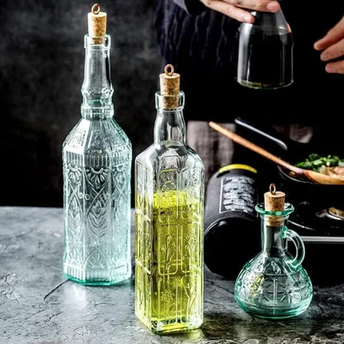 Vista 5 de Bormioli Rocco Juego de 2 botellas Country Home Fiesole de 24 onzas con tapa de corcho natural, cristal de estrella teñido azul-verde, diseño