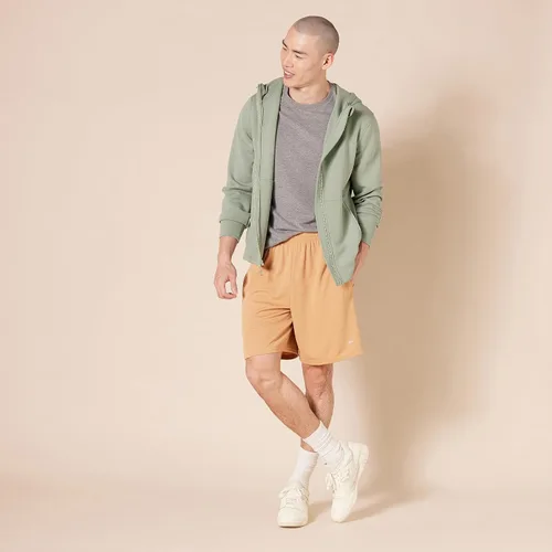Vista 6 de Tienda Essentials - Pantalones cortos de corte suelto con tecnología de rendimiento para hombre
