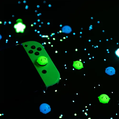 Vista 5 de GeekShare Lindas tapas luminosas de silicona para Joycon con agarre para pulgar, funda de joystick compatible con Nintendo SwitchOLEDSwitch Lite, 4