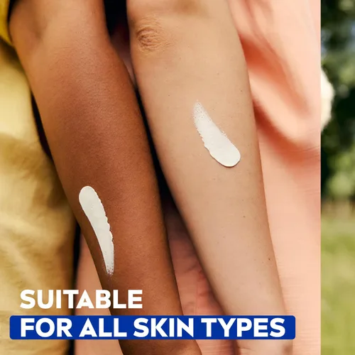 Vista 9 de NIVEA Crema hidratante para el cuerpo, la cara y las manos, fórmula alemana, rica crema hidratante corporal con provitamina B5, lata de 8.4 onzas