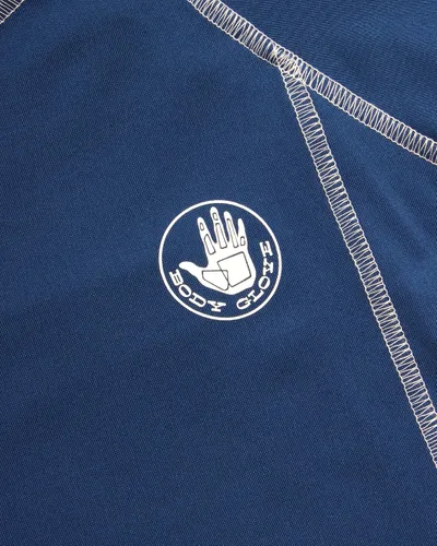 Vista 4 de Body Glove Camiseta de protección contra erupciones para niños UPF 50+ de secado rápido protección solar y arena Trajes de baño para niños (5-14)