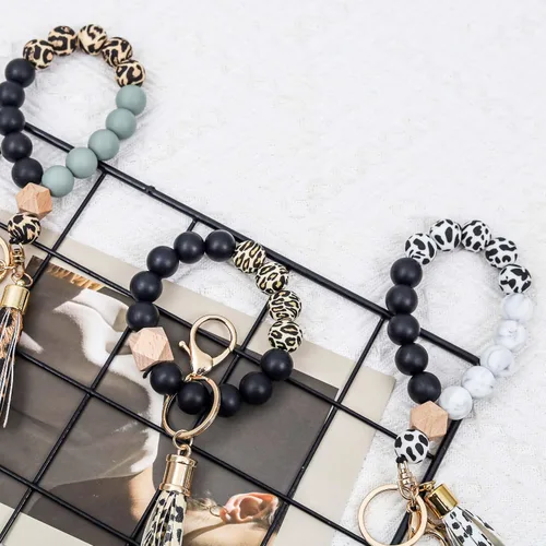 Vista 5 de Llavero de silicona para mujer, pulsera con cuentas para automóvil