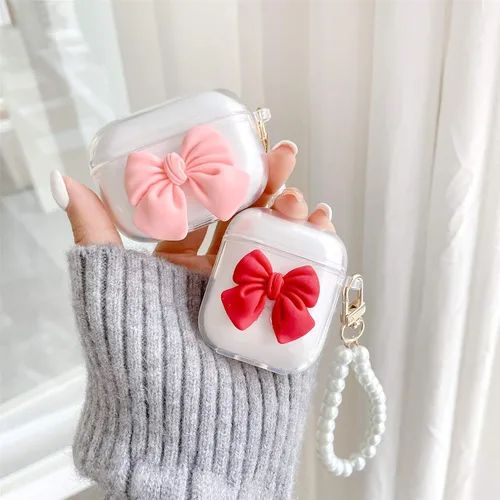Vista 4 de Funda transparente compatible con AirPods 1 y 2, hermoso diseño de lazo colorido con pulsera de perlas de lujo, ultrafina, funda protectora de RosaA