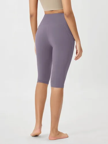 Vista 3 de ODODOS - Leggings tipo capri de mujer, no se traslucen y modelan el abdomen, con cintura alta y bolsillos para hacer yoga, atletismo, ejercicio
