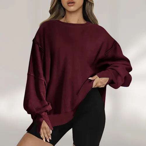 Vista 2 de Ceboyel Sudadera de gran tamaño para mujer 2023, color sólido, cuello redondo, suéter con abertura lateral, cómodo ropa de moda de otoño