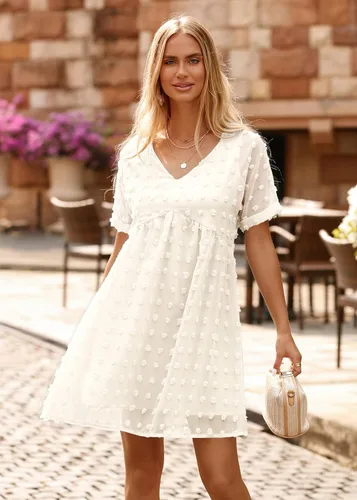 Vista 4 de KIRUNDO Vestido corto de manga corta de verano para mujer, vestido casual, suelto y con un cuello en V sexy, vestido holgado de punto suizo