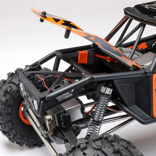 Vista 9 de Axial RC Crawler 1/10 UTB10 Capra 1.9 4WS 4X4 RTR Crawler de roca con cepillo, naranja, AXI-1543T1
