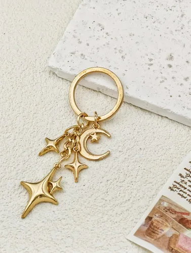 Vista 2 de Llavero de estrella brillante dorado con dije celestial, llavero de metal duradero para llaves, bolsas, regalo estético, decoración de fiesta