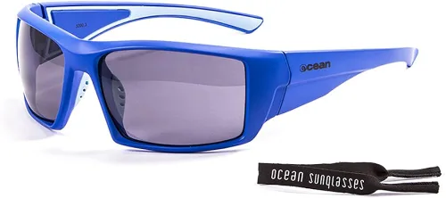 Vista 2 de OCEAN Aruba - Gafas de sol polarizadas para deportes acuáticos, montura azul y lente ahumada, 100% UVA y UVB, gafas flotantes para kitesurf, SUP