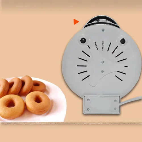 Vista 9 de Mini máquina para hacer donas, perfecta para desayunos, aperitivos y postres, superficie antiadherente que hace que 7 donas enchufe de EE. UU. 110V