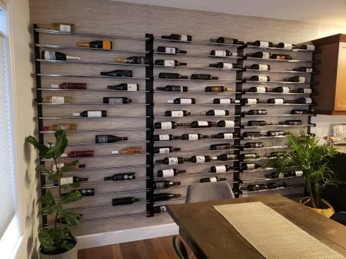 Vista 9 de VintageView Evolution Wine Wall 30 3C - Estante moderno para vino (54 botellas, negro mate/bronce dorado)
