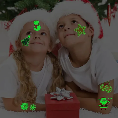 Vista 6 de CHARLENT Tatuajes temporales de Navidad que brillan en la oscuridad para suministros de fiesta de niños, 74 hojas individuales, tatuajes luminosos