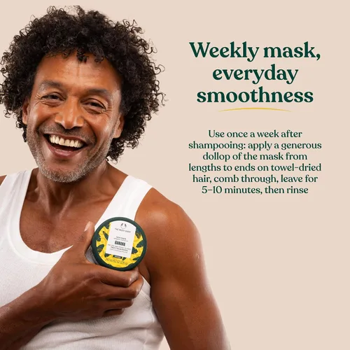 Vista 4 de The Body Shop Banana Truly - Mascarilla nutritiva para el cabello, 8.2 onzas líquidas (vegana)