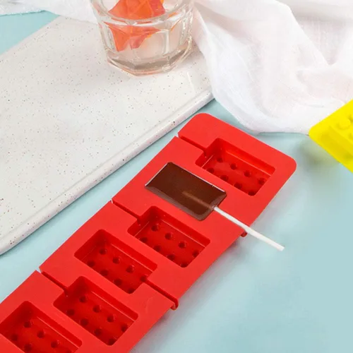 Vista 4 de Webake Moldes de silicona para piruletas, juego de 3 moldes de caramelo duro de chocolate con ladrillo (incluye 100 palitos de papel)