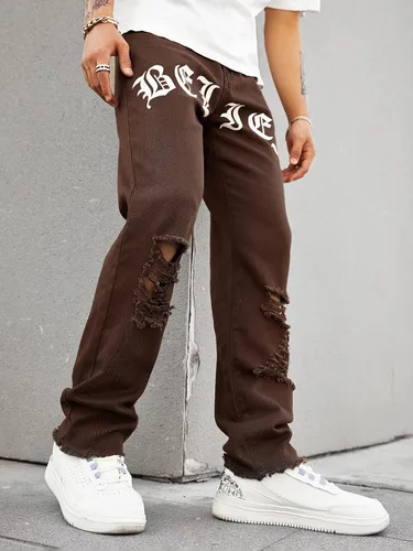 Vista 4 de WDIRARA Pantalones de mezclilla largos rasgados de cintura alta para hombre con bolsillo