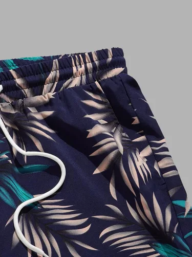 Vista 85 de GORGLITTER Conjunto de 2 piezas de camiseta gráfica de manga corta para hombre, estampado hawaiano con cordón y pantalones cortos