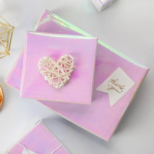 Vista 2 de Papel de regalo iridiscente metálico - 17 pulgadas x 33 pies - Patrón holográfico iridiscente rosa femenino para niñas, papel de regalo de hadas