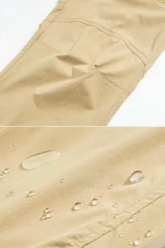 Vista 5 de MAGCOMSEN Pantalones tácticos para hombre, repelentes al agua, 8 bolsillos, tela Ripstop, pantalones de senderismo ligeros