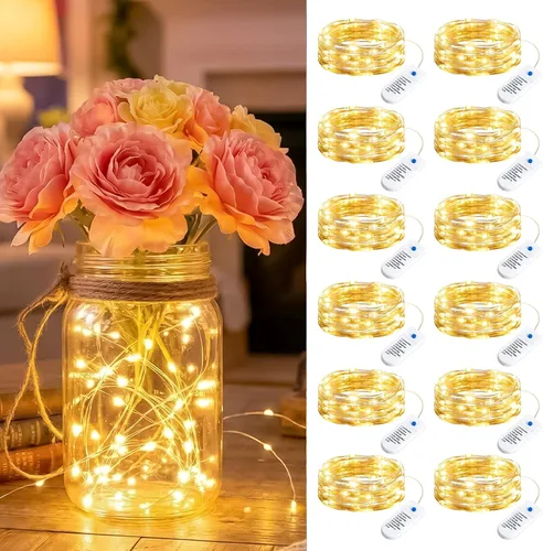Vista 17 de Minetom Paquete de 12 luces de hadas que funcionan con pilas, 8 modos, 7 pies, 20 LED, 6 colores, impermeables, alambre plateado, luces