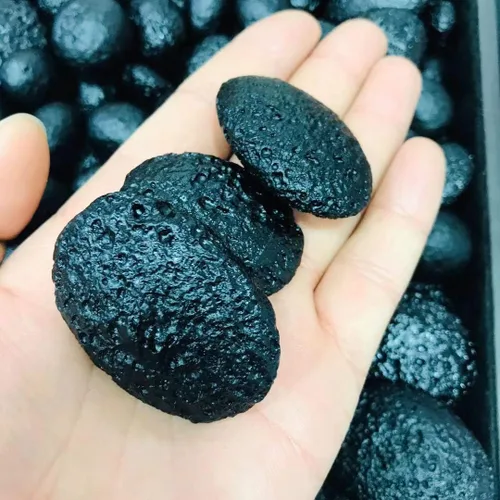 Vista 4 de 1pcs piedra natural natural meteorito cuarzo oval piedra áspera negro tektite espécimen para la venta