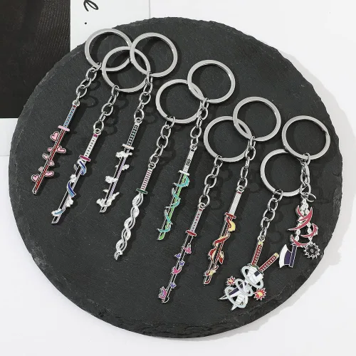 Vista 6 de YURAOER Juego de llaveros de anime Slayer Figuras de dibujos animados 9 Hashiras Mini Katana llaveros esmaltados para hombres y mujeres