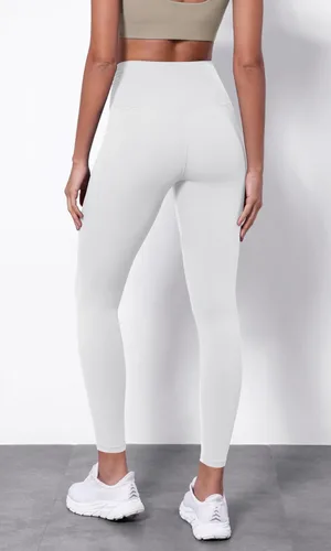 Vista 2 de ODODOS Leggings de yoga con cintura cruzada para mujer con bolsillos, pantalones de yoga de entrenamiento cruzado de 2528 pulgadas