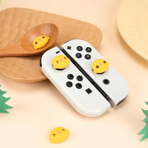 Vista 4 de GeekShare Lindas tapas de silicona Joycon para pulgar, cubierta de joystick compatible con Nintendo SwitchOLEDSwitch Lite, 4 piezas - BIU