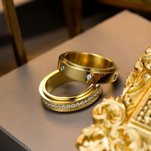 Vista 5 de Kainier Anillos de ansiedad chapados en oro de 14 quilates piedras de circonita cúbica anillos giratorios para mujeres y hombres anillos