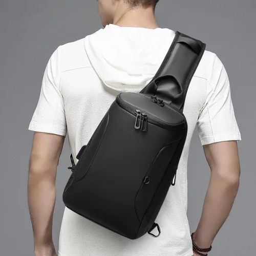 Vista 7 de Leathario Bolso bandolera de cuero para hombre, mochila cruzada para el pecho, mochila pequeña, multiusos, casual, viajes, Negro