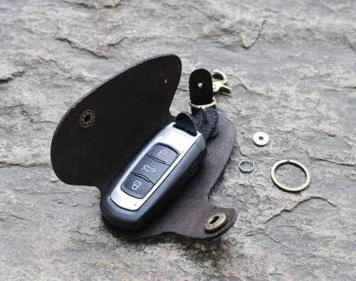 Vista 3 de Mejora la seguridad para evitar que se caiga de cuero genuino para llaves de puerta de coche, protector de llaves