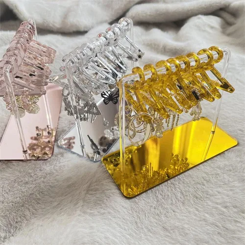 Vista 6 de XINZHIDA Perchero para aretes con 8 mini percheros, soporte de exhibición de acrílico para aretes, organizador de aretes colgantes para mujeres