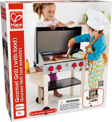 Vista 2 de Hape, Parrilla para barbacoa de juguete con set de comida de juguete para cocinar brochetas de madera con accesorios